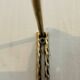 Adjustable vintage wall shelf in black metal and brass