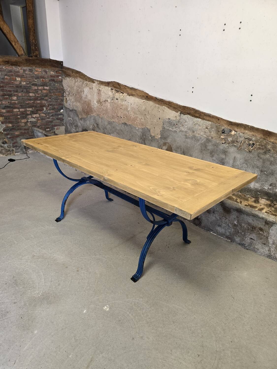 Wrought iron and solid wood table