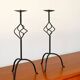 Pair of twisted tripod candlesticks in black iron, Brutalist, 1970 - 44 cm