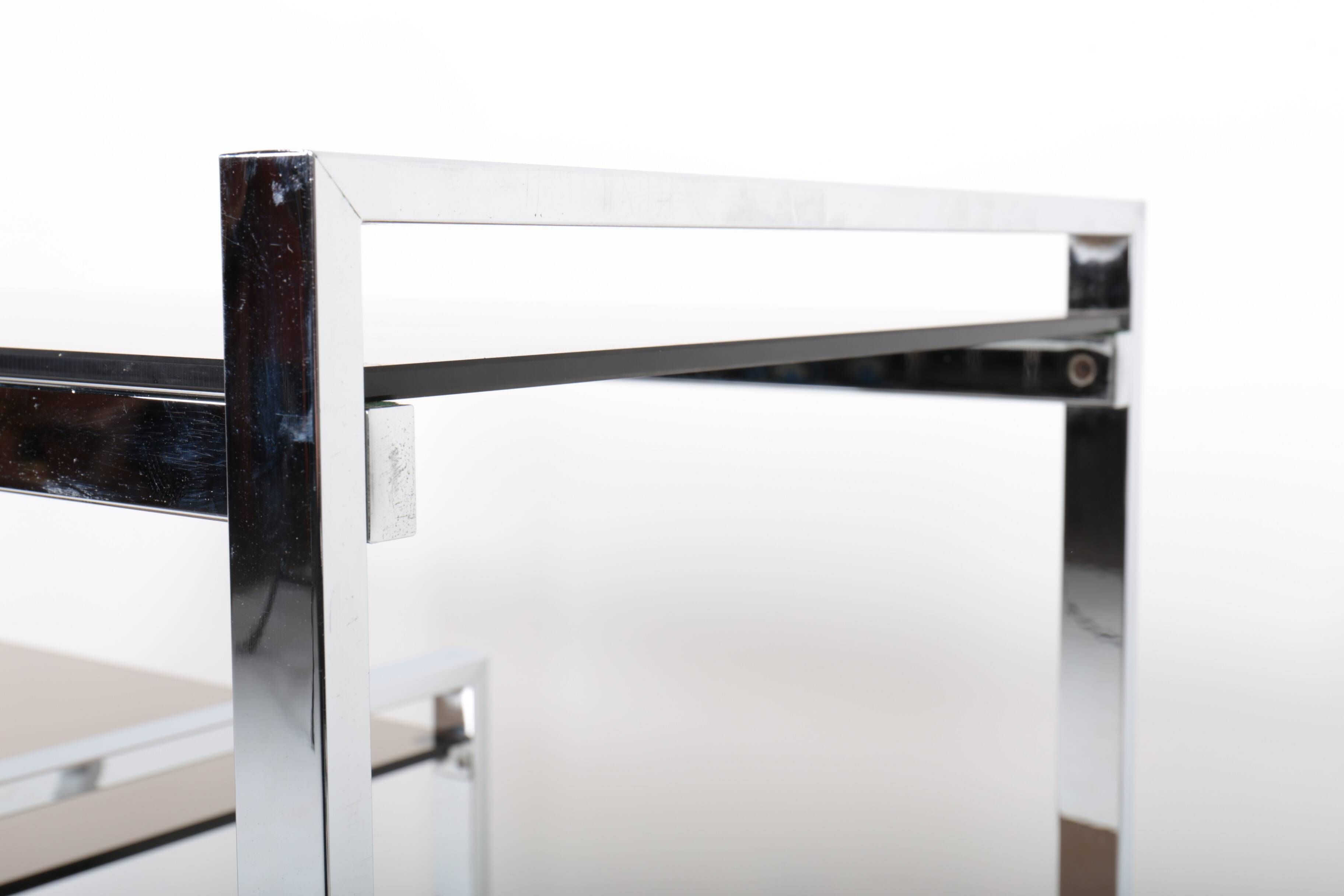 Vintage hifi or TV unit in chrome steel and smoked glass