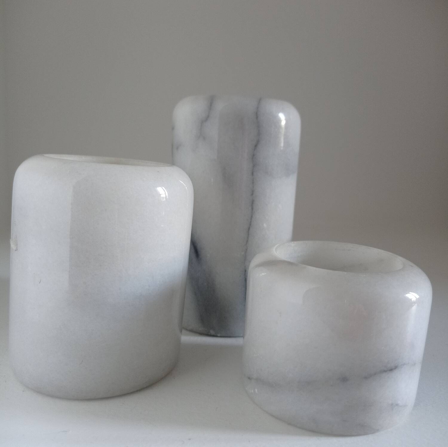 Trio of marble candlesticks