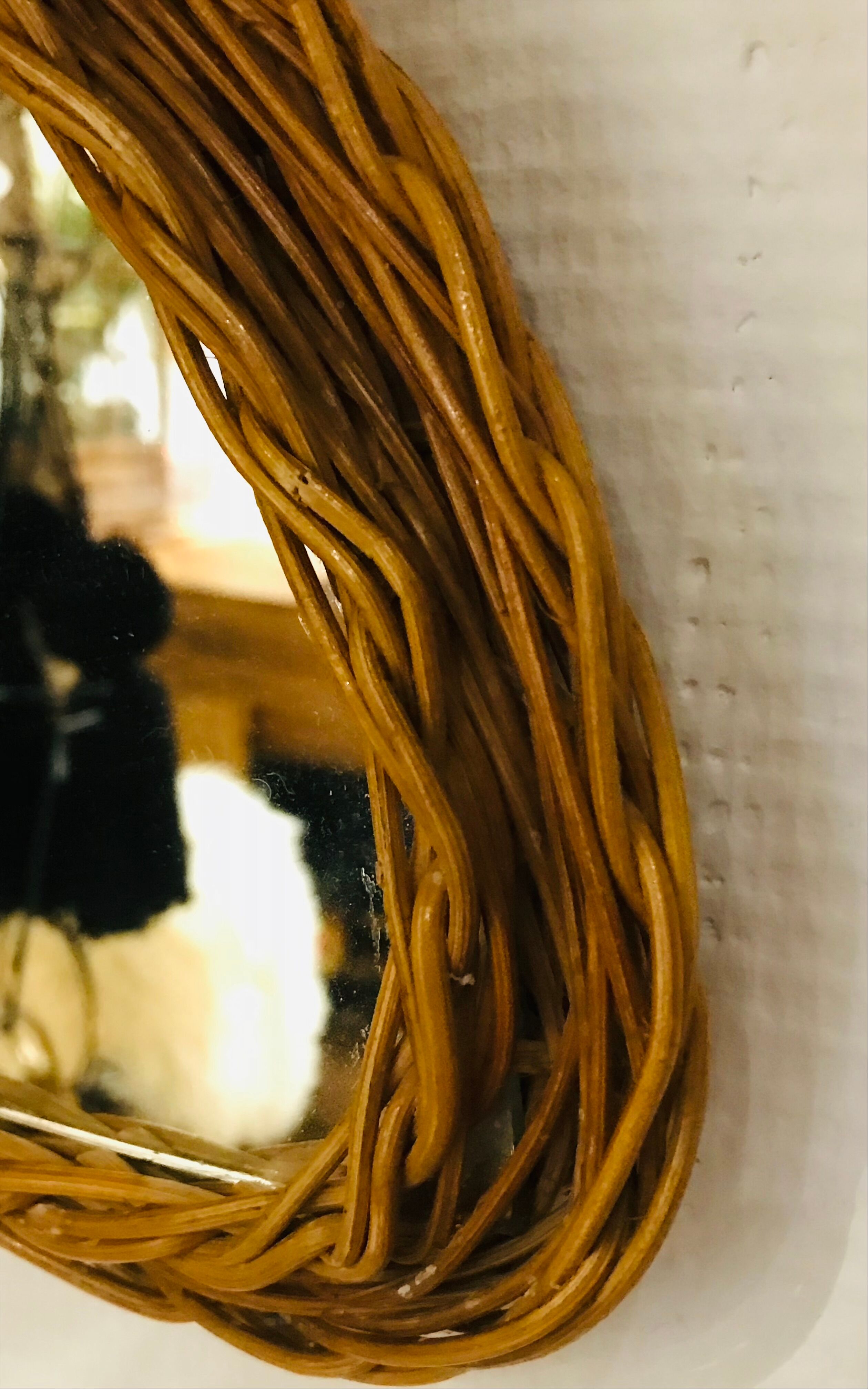 Vintage half moon rattan mirror