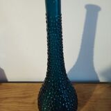 bottle made of blue vintage molded glass