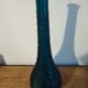 bottle made of blue vintage molded glass