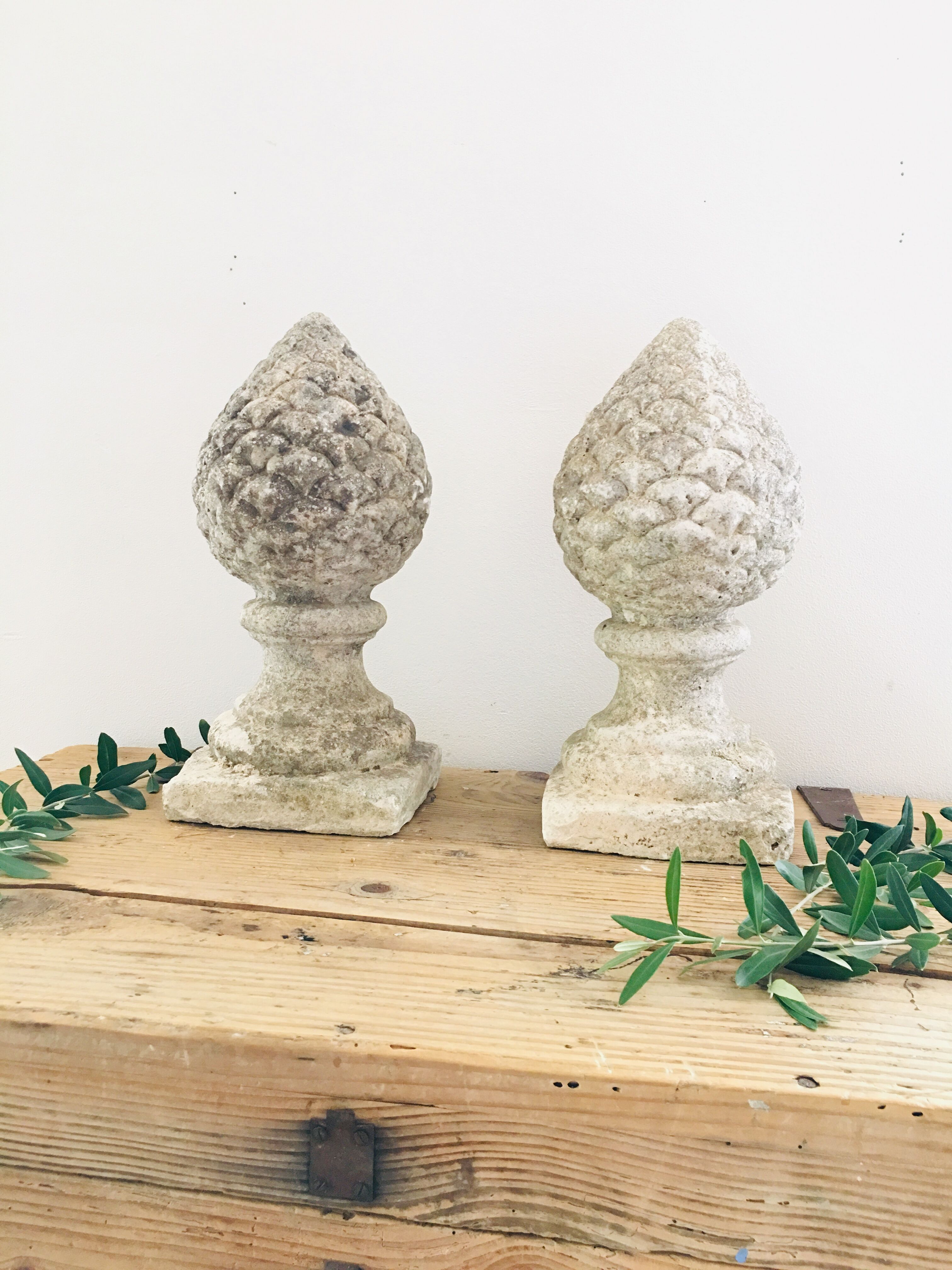 Pair of stone pine cones