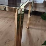 Table basse laiton plateau verre fumé