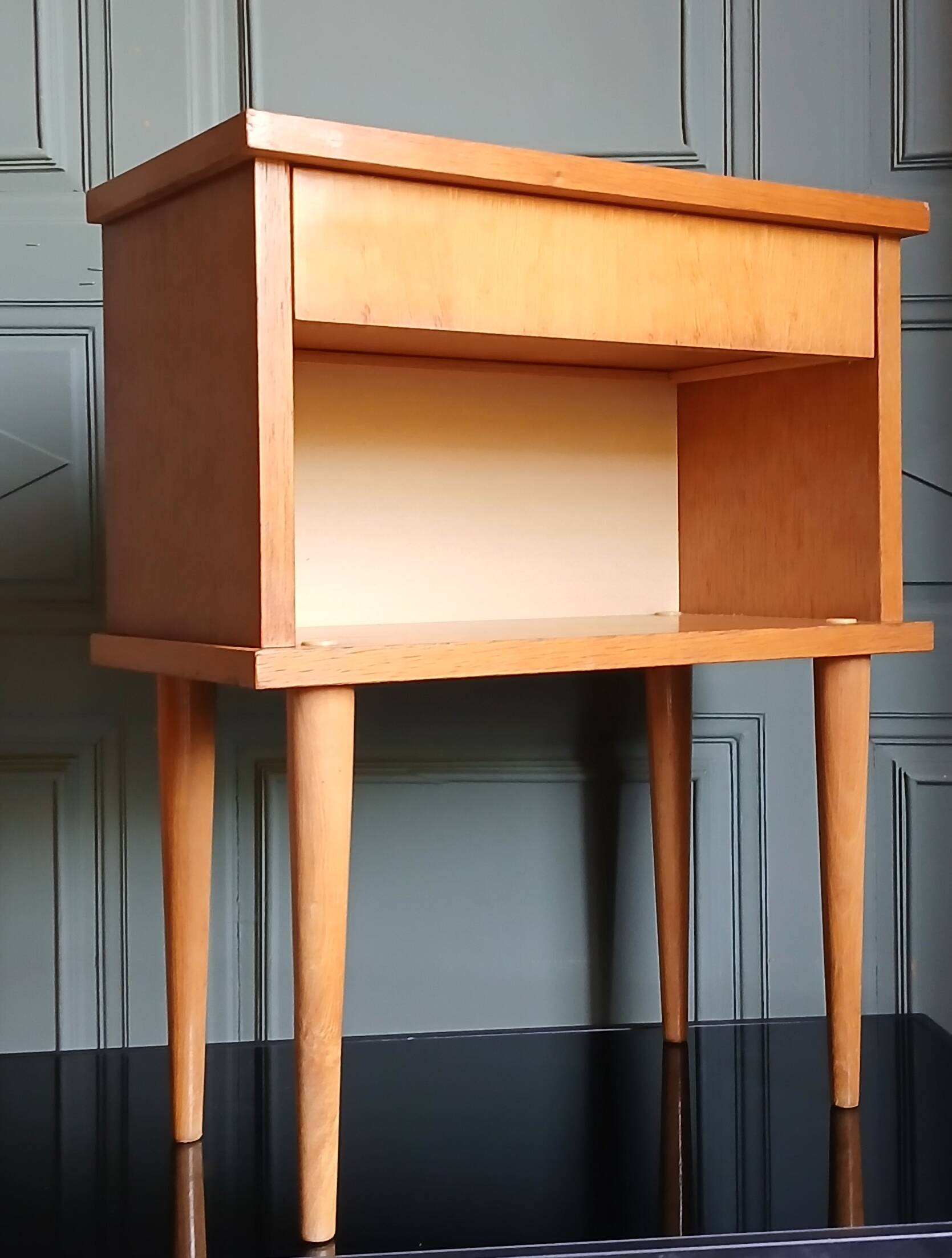 Nightstand in golden oak veneer. Around 1970.
