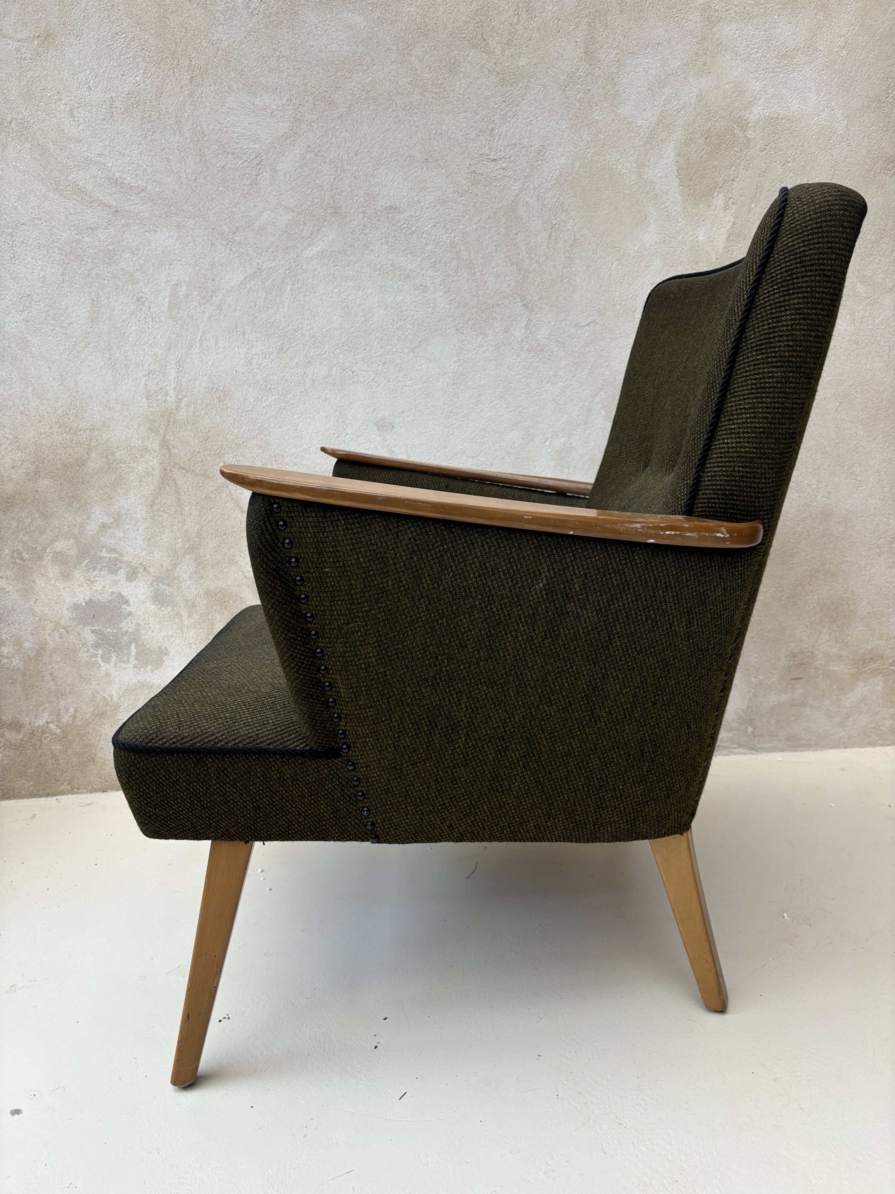 Pair of vintage wooden and fabric armchairs from the 1960s.