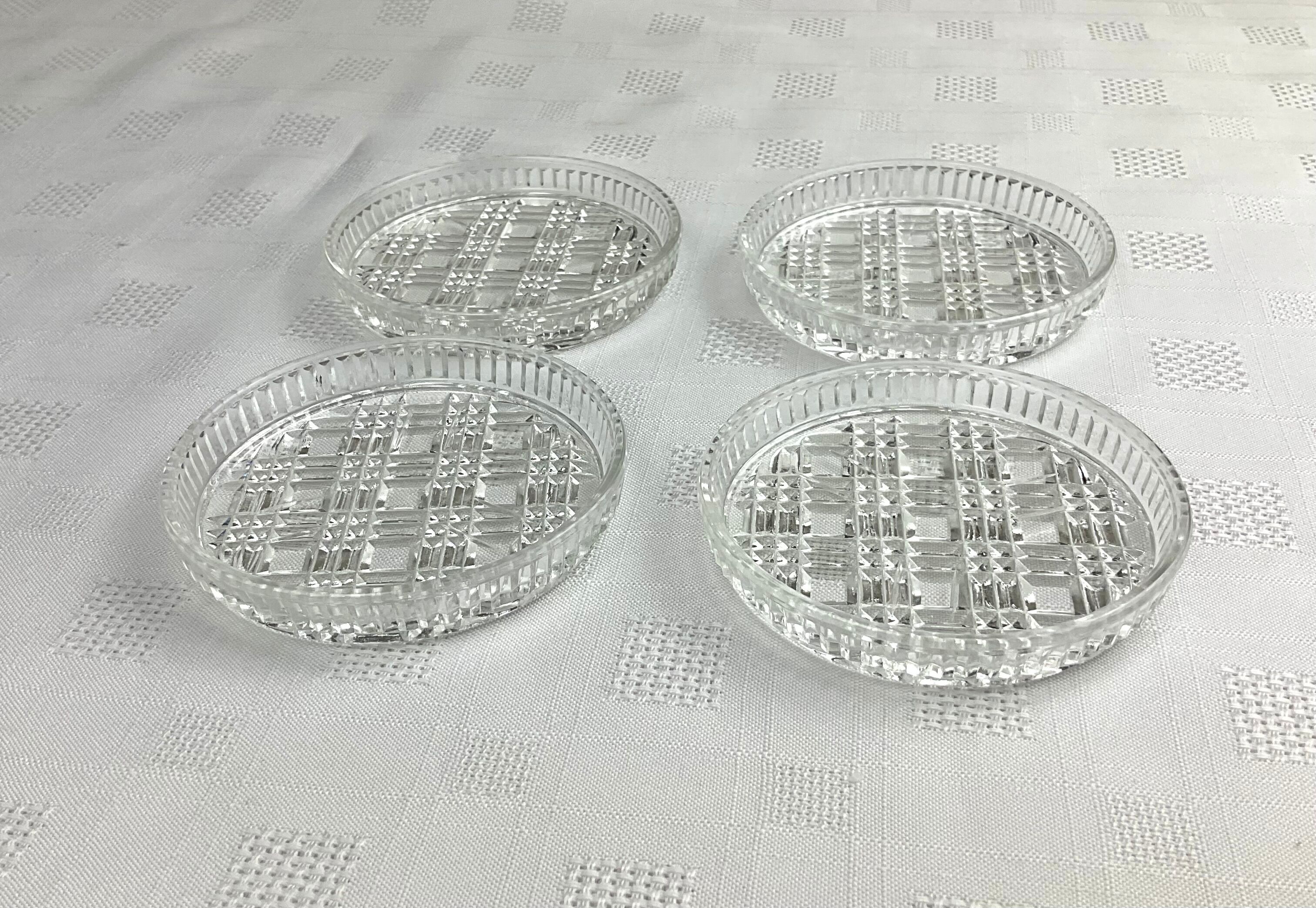 Series of 4 vintage glass coasters