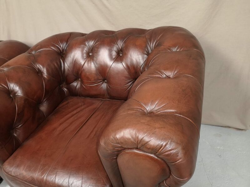 Brown brown leather chesterfield armchairs