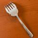 Christofle Aria gold ring serving fork