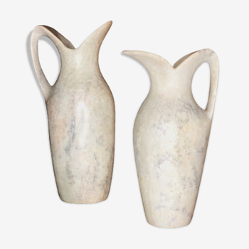 2 jugs in rough cut stone