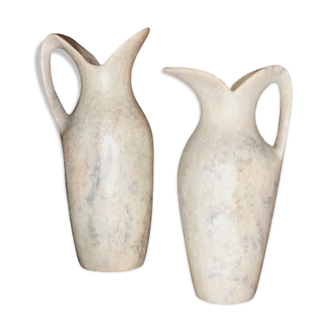 2 jugs in rough cut stone