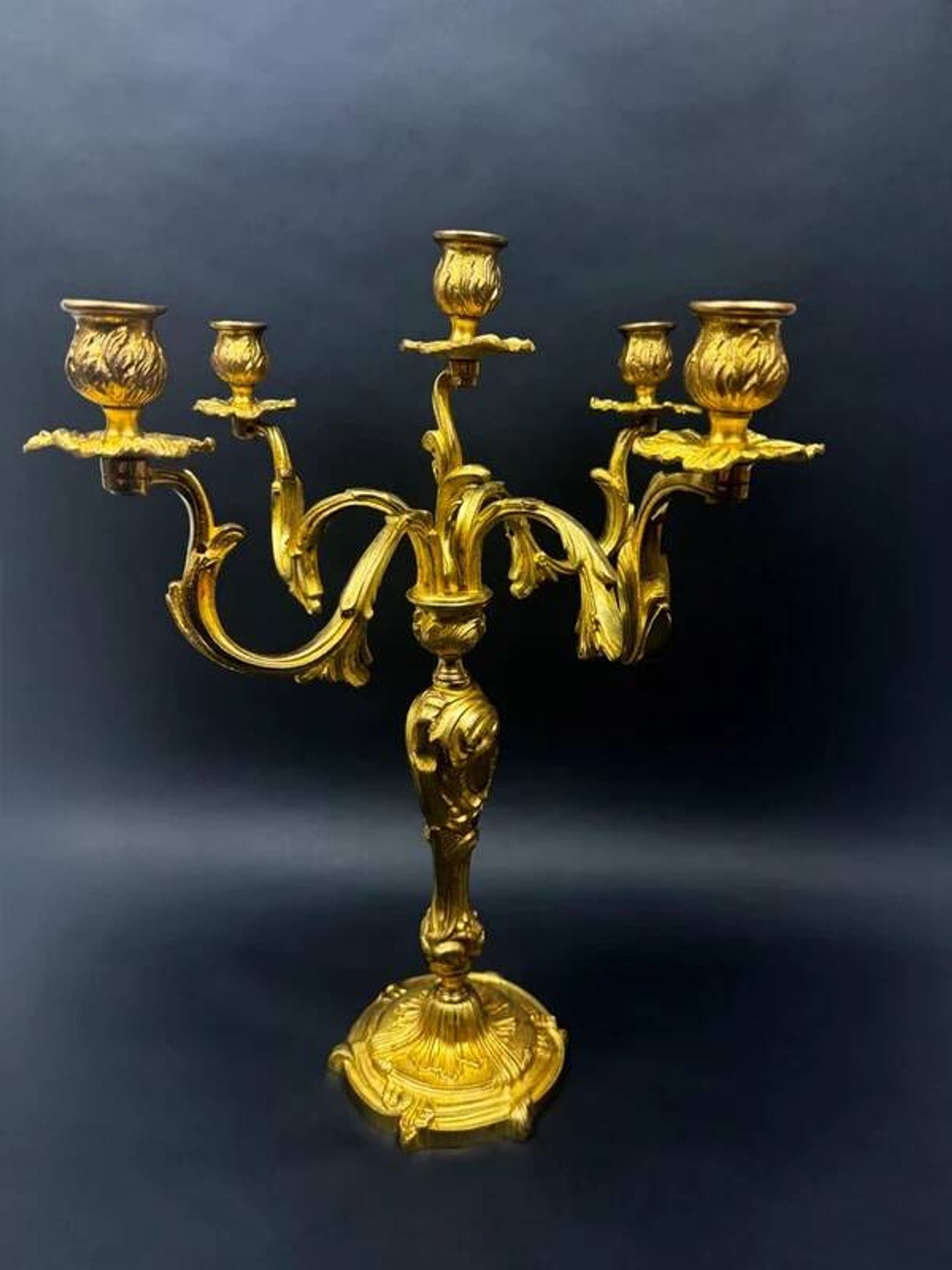 Very large five-light candelabra, in the Louis XV rocaille style, made of gilt bronze.