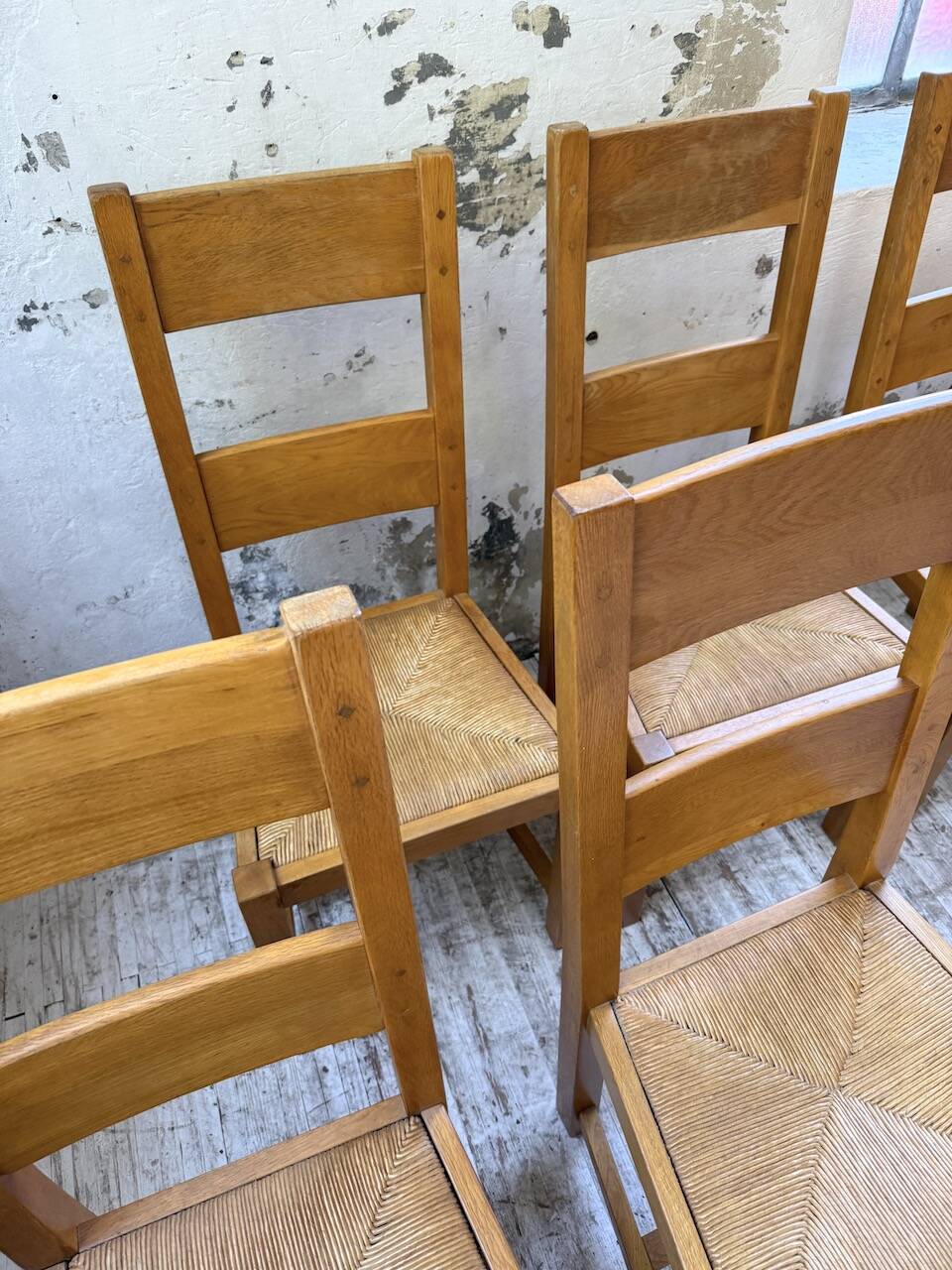 Set of 8 blond oak chairs with straw seats