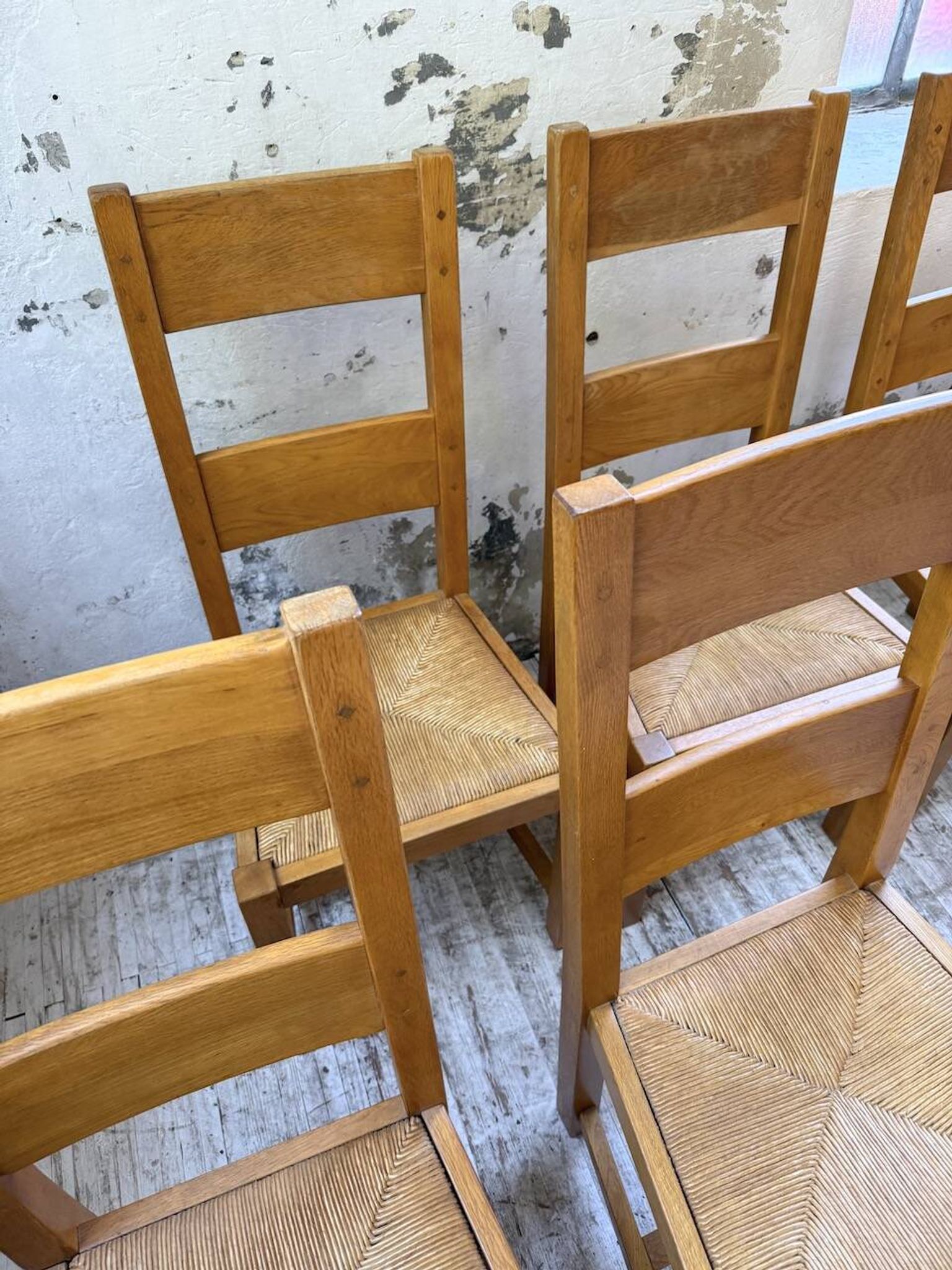 Set of 8 blond oak chairs with straw seats