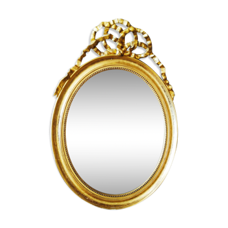 Golden mirror with Louis XVI-style knot - 89x65cm