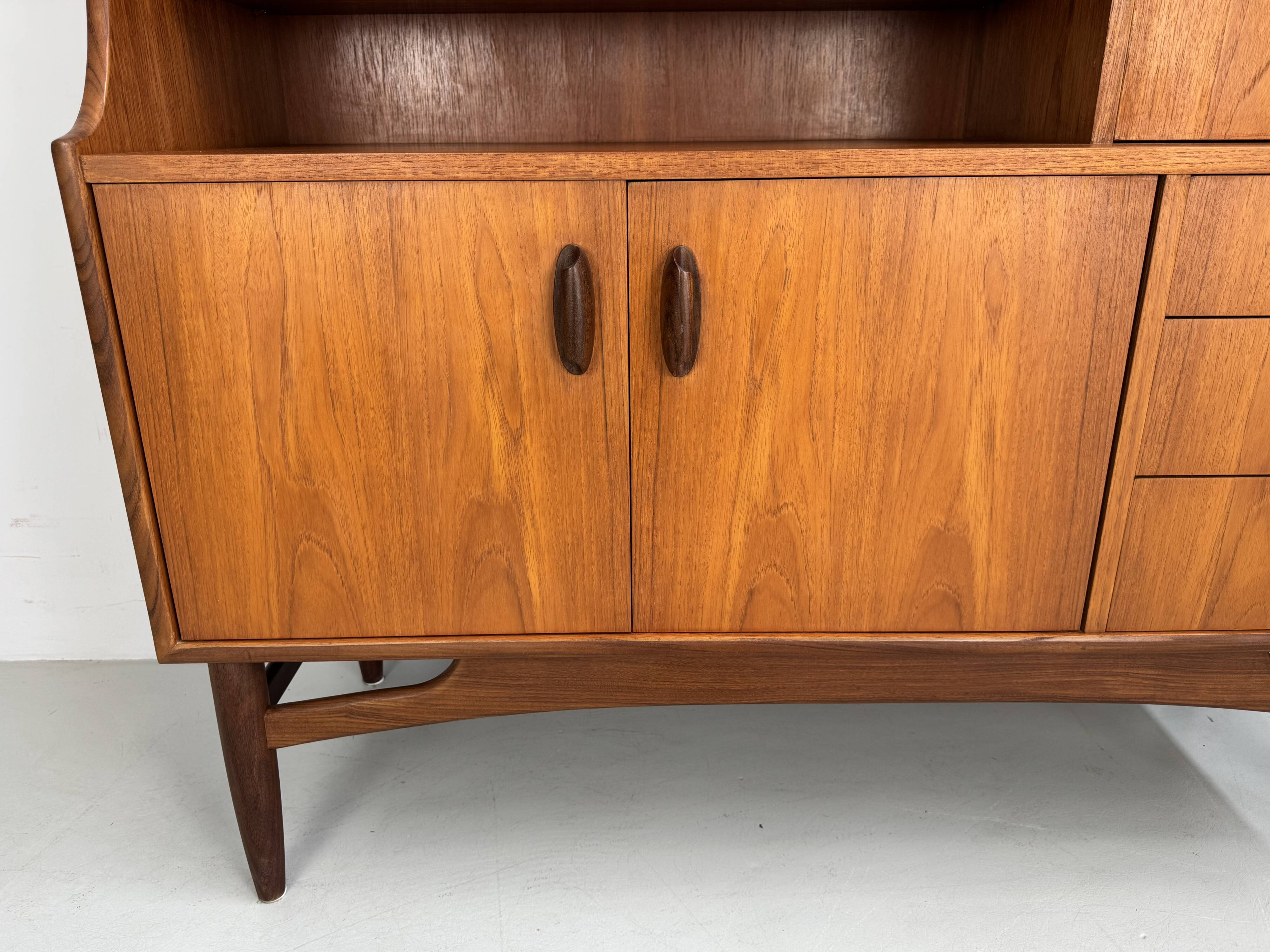 Unique and rare vintage highboard/wall unit from the 1960s made of teak.