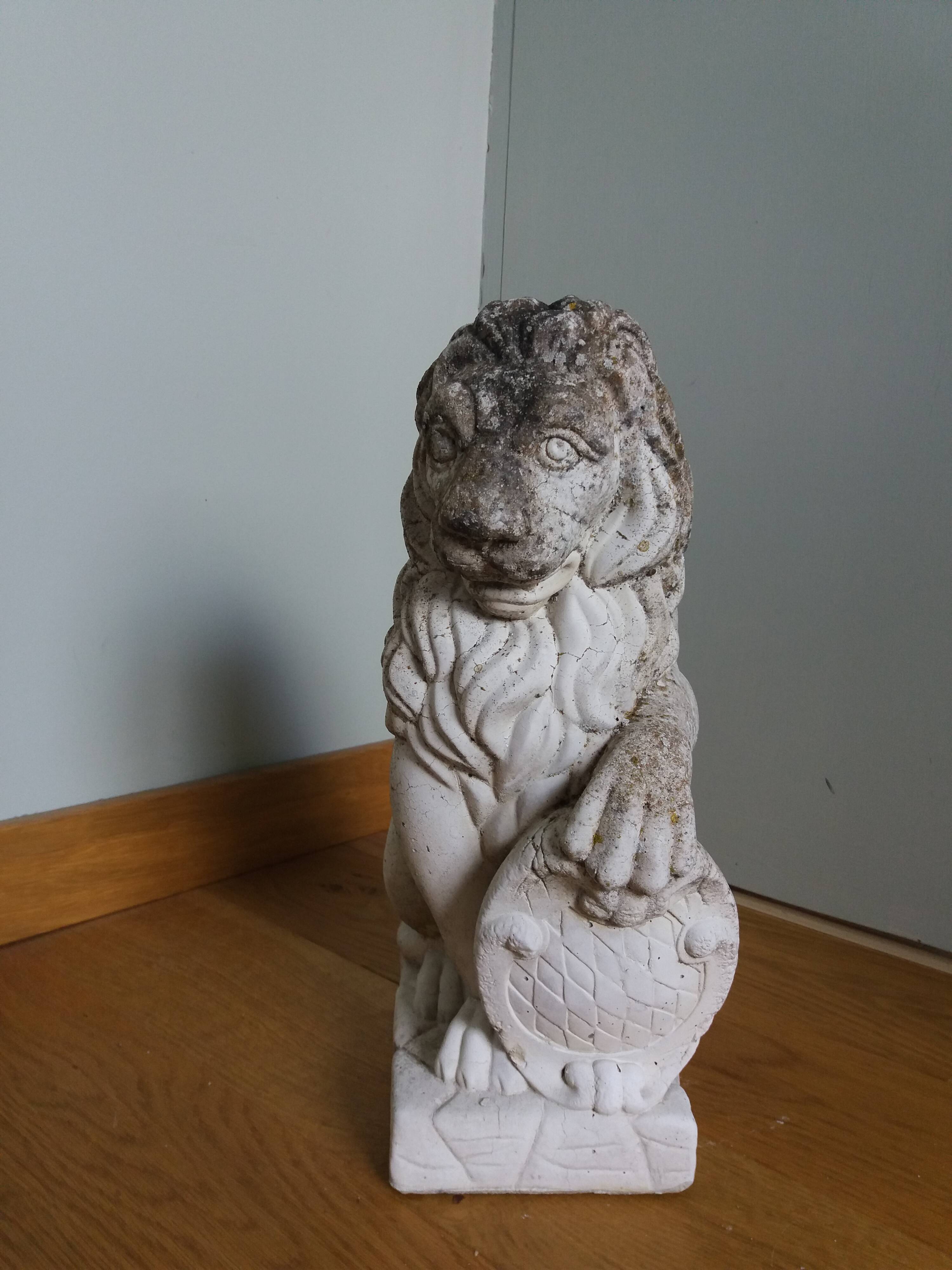 Lion garden statue in reconstituted stone