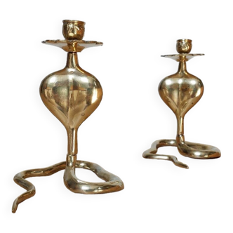 Pair of brass cobra candlesticks