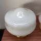 Pair of white opaline globe wall lights