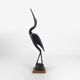 Pair of cranes in carved horn design Mid-Century
