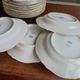 12 semi-hollow plates in Vierzon porcelain decorated with flowers and gilding