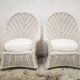 Pair of white rattan armchairs