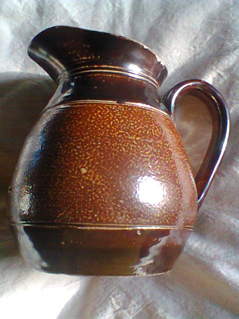 JEB stoneware jug