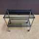 Metal and smoked glass dessert table