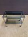 Metal and smoked glass dessert table