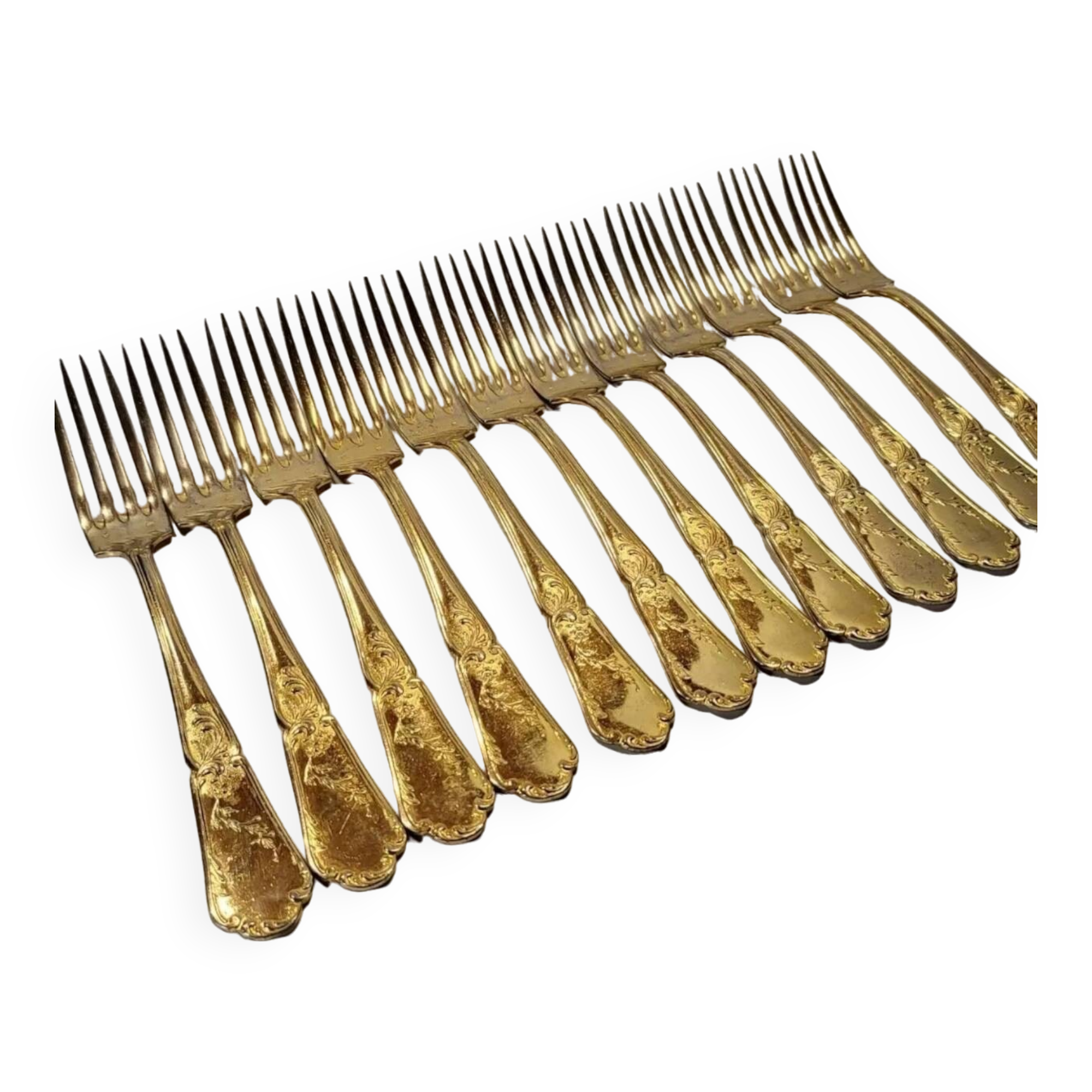 12 Table Forks in gold metal