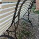 Antique garden bench with cast iron legs
