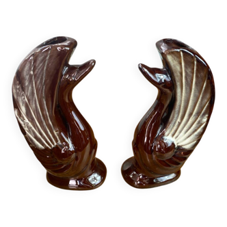 Pair of ceramic vases in the shape of swans.