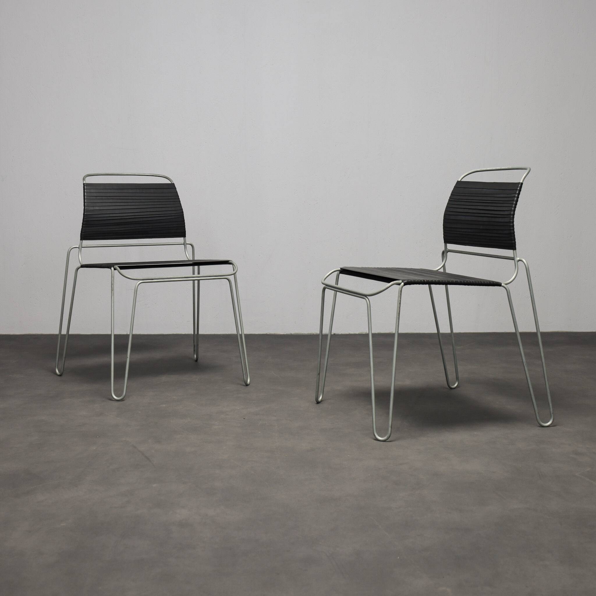 Rare pair of “Rubber Band” chairs by Tom Dixon