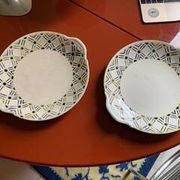 Lot de deux plats en terre de fer années 30