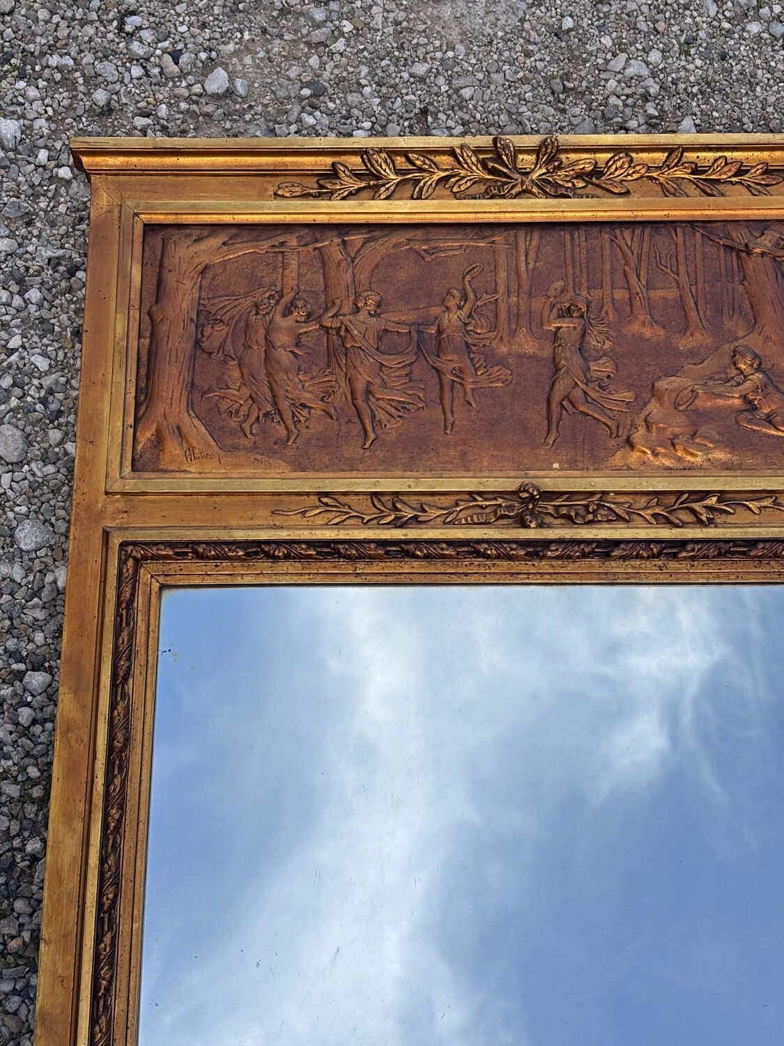 Golden trumeau mirror in Louis XVI style, 20th century.