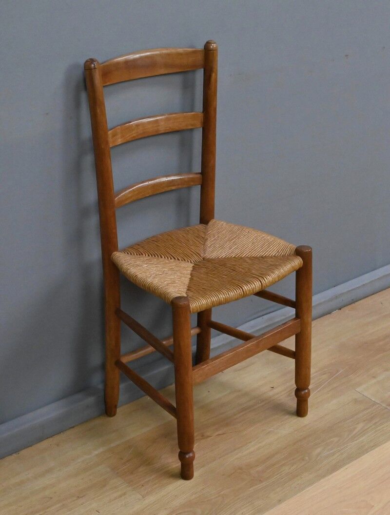 Set of 4 rush-seated chairs in cherry wood – late 19th century