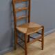 Set of 4 rush-seated chairs in cherry wood – late 19th century