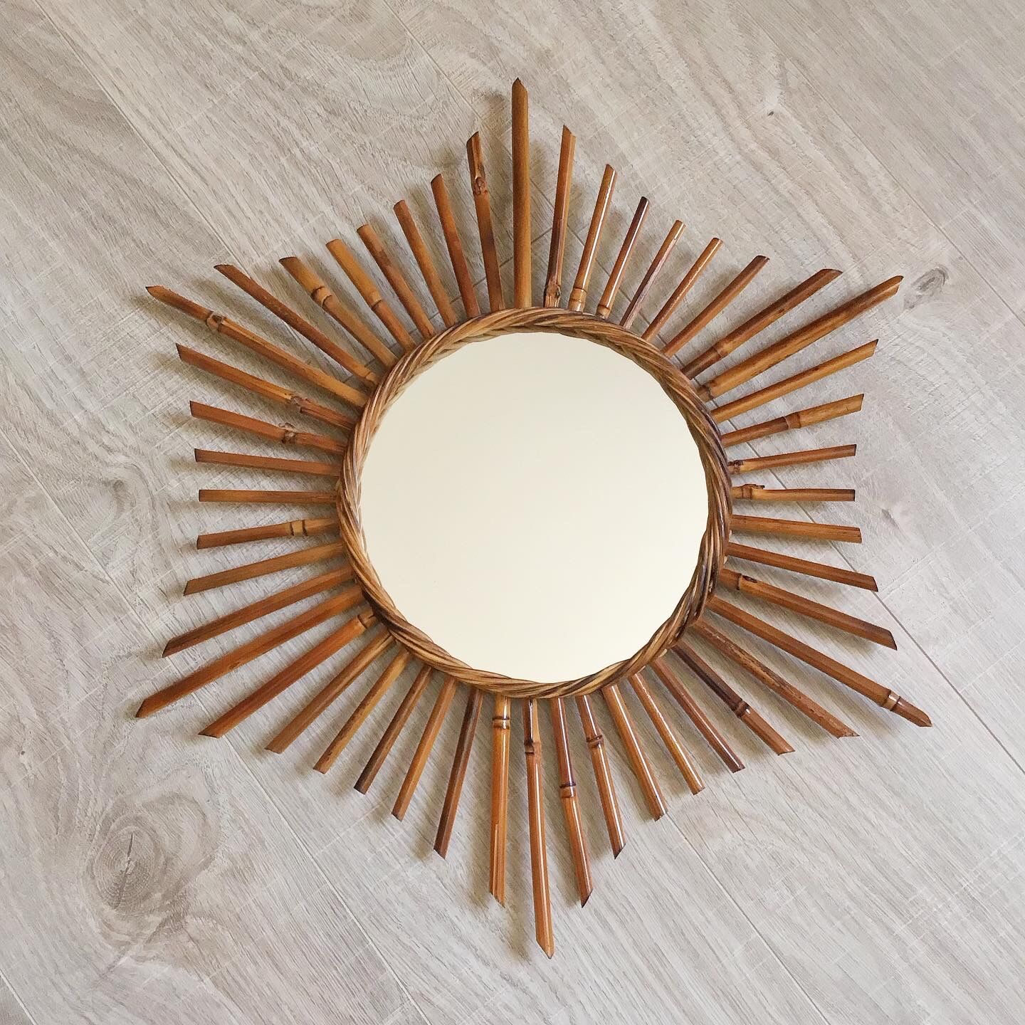Vintage rattan sun mirror