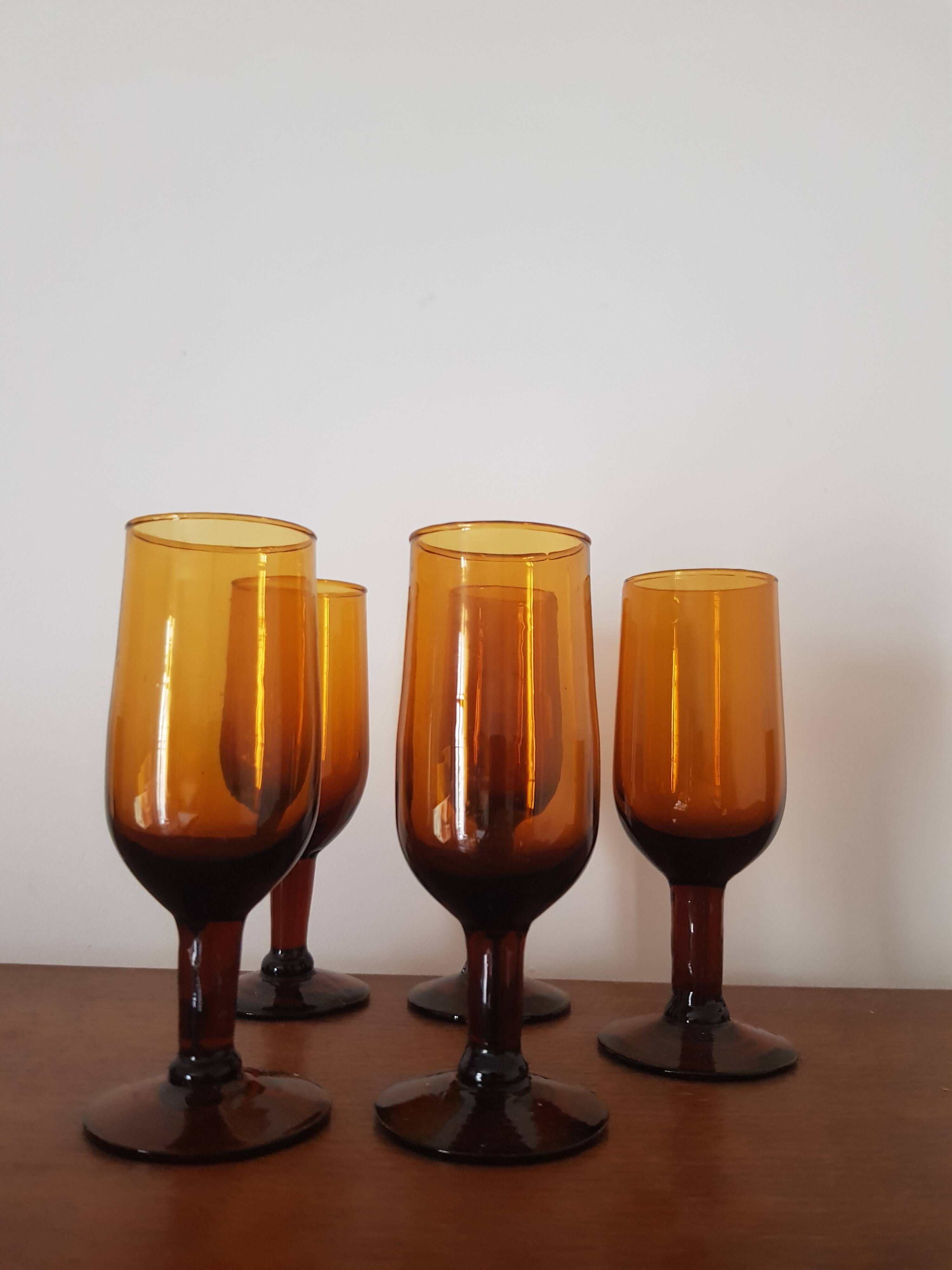 Set of 5 amber stemmed glasses