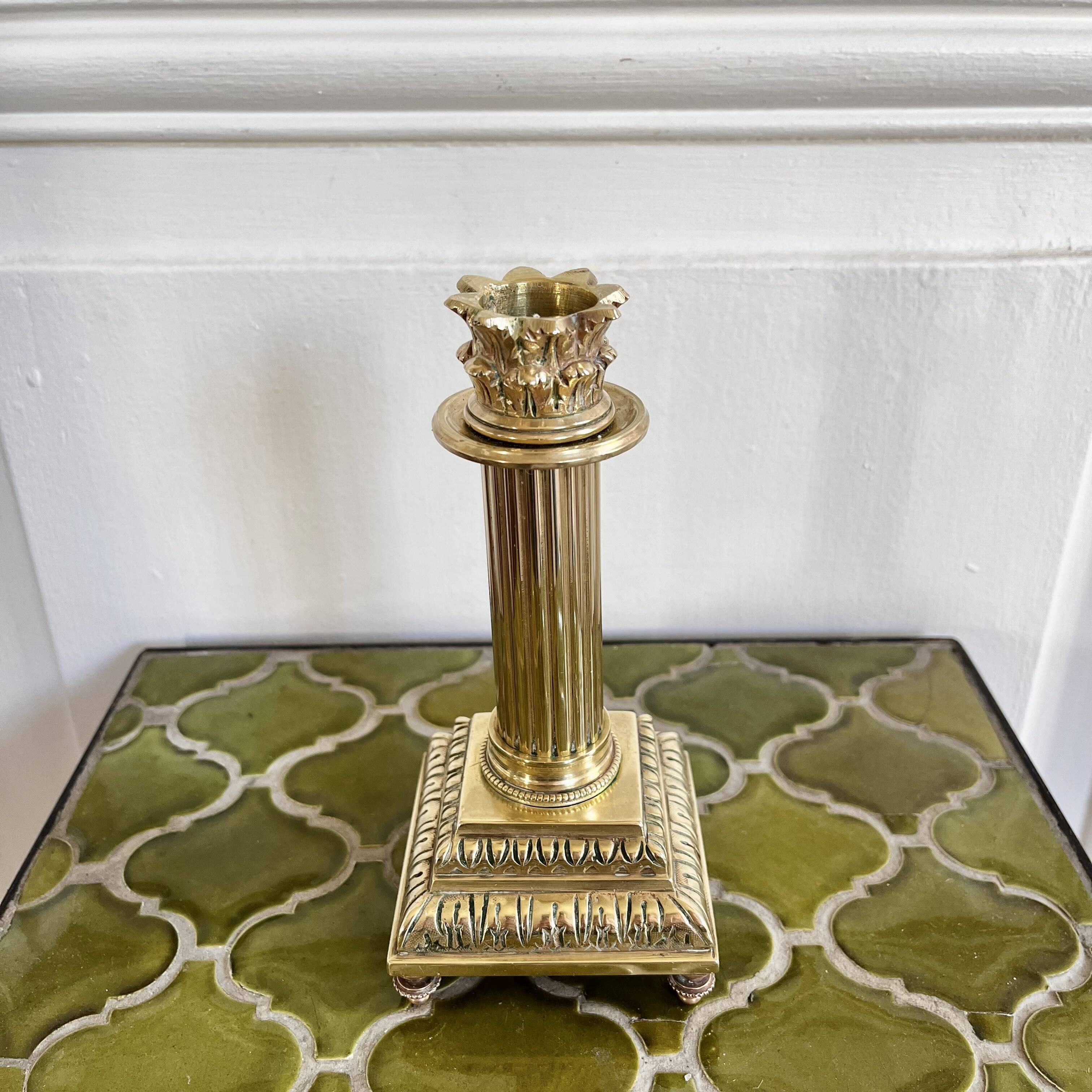 Empire style gold candle holder