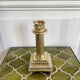 Empire style gold candle holder