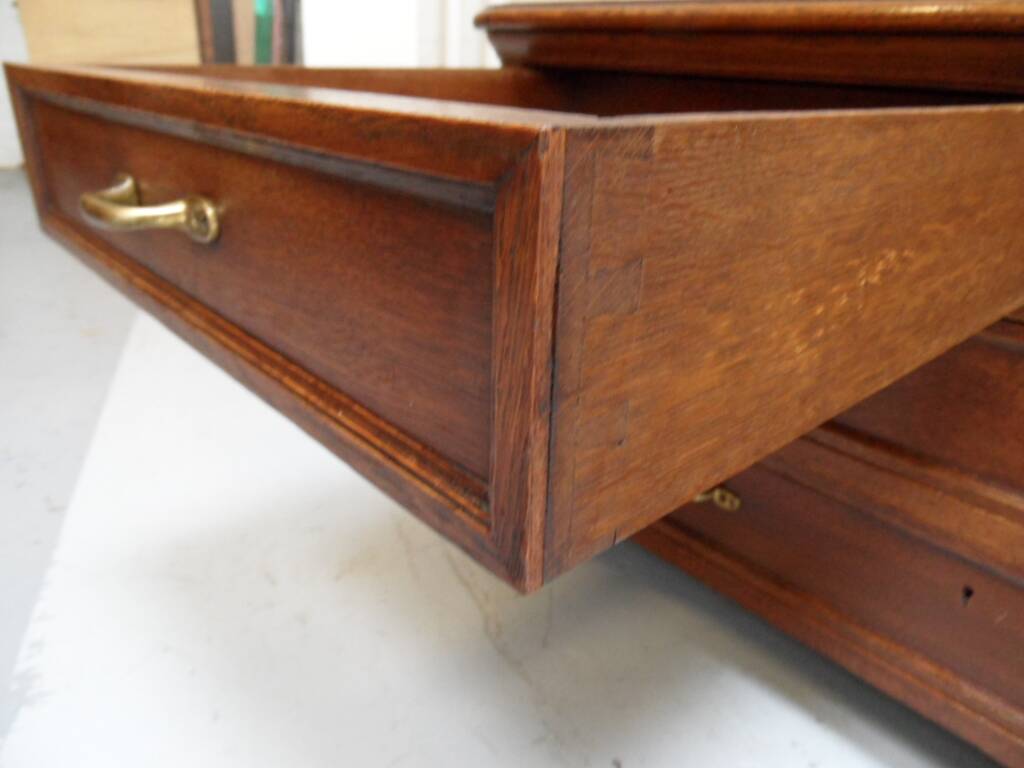Antique oak filing cabinet with drawers
