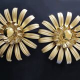 Golden metal flower sconces