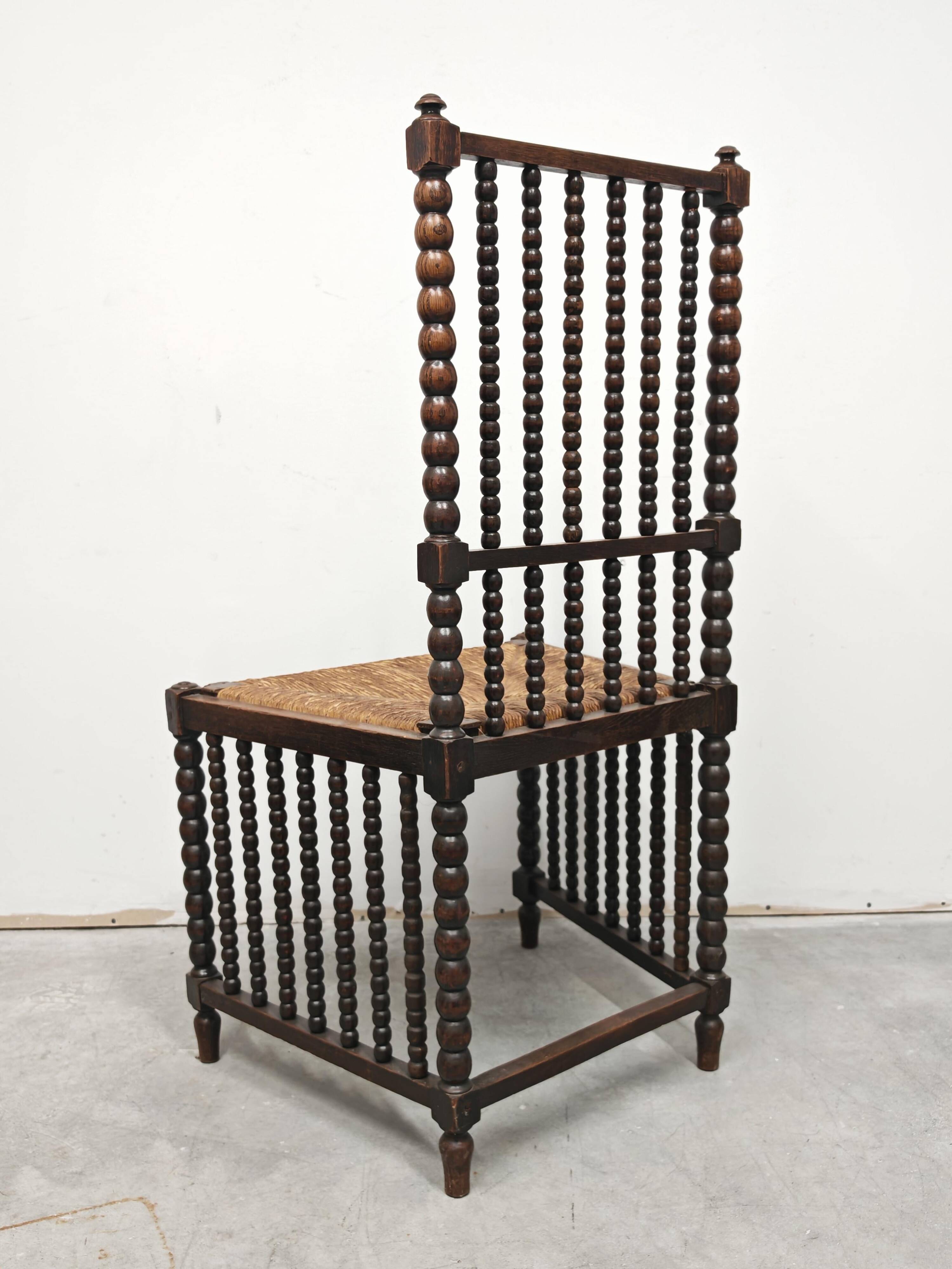 Antique High Back Bobbin Chair in Oak with Straw Seat, 1900s
