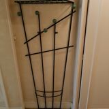 Wall-mounted metal coat rack