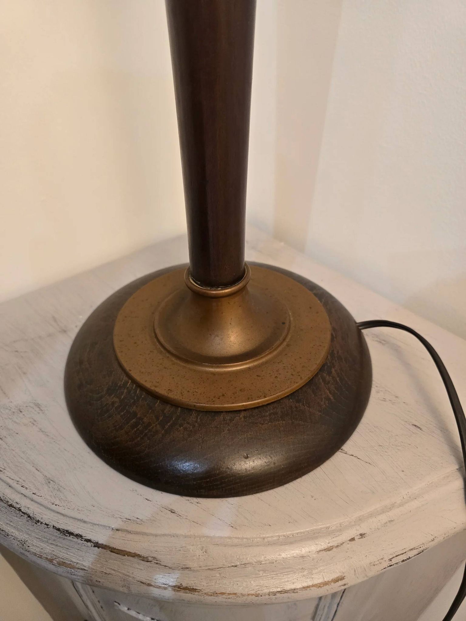 Vintage lamp base in Scandinavian style made of dark wood and bronze metal.