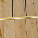 Glass coffee table with magazines holder