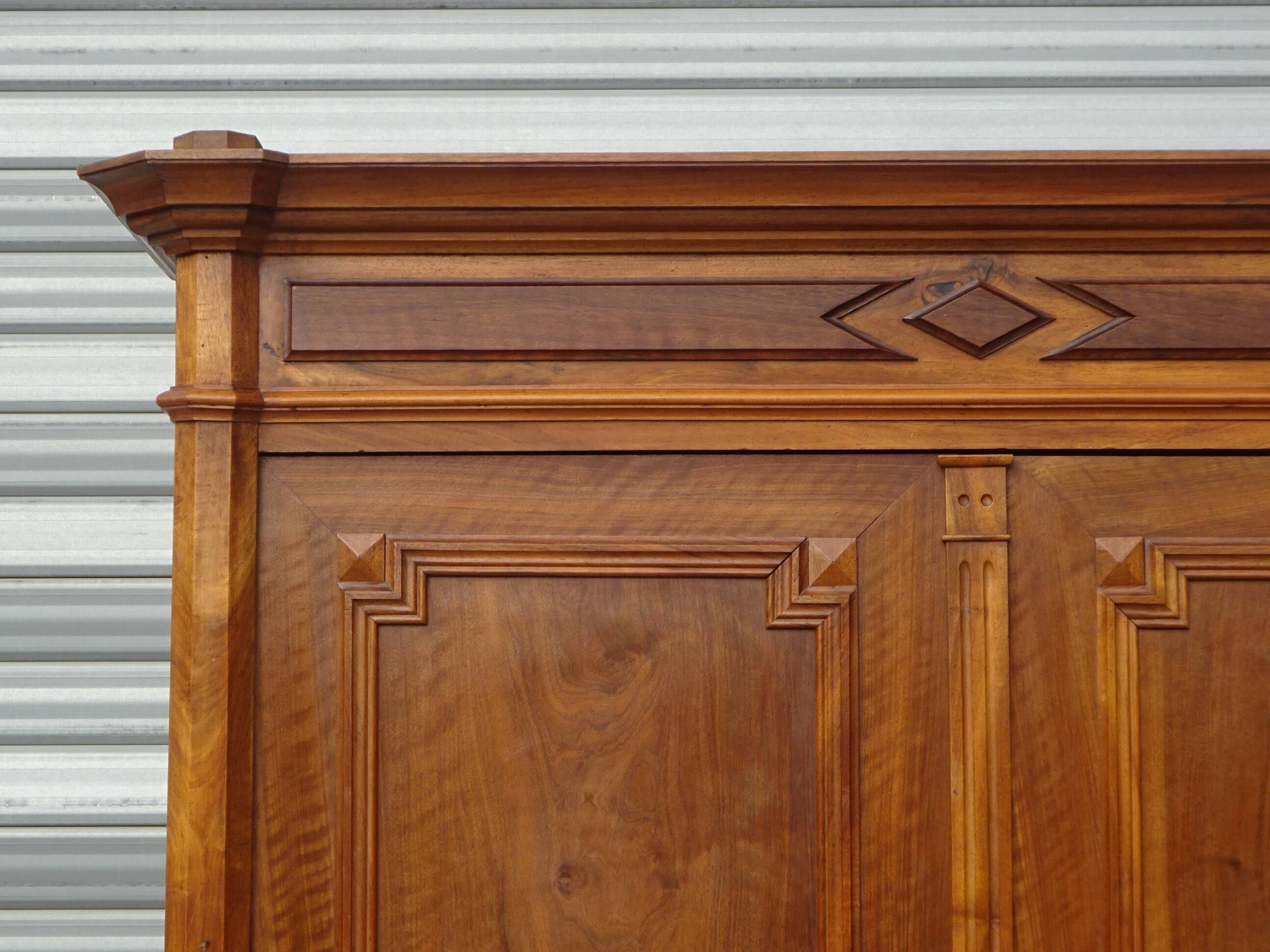 Large antique wardrobe in solid walnut